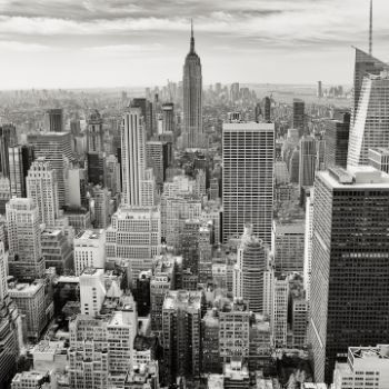 A black and white photo of the new york city skyline.